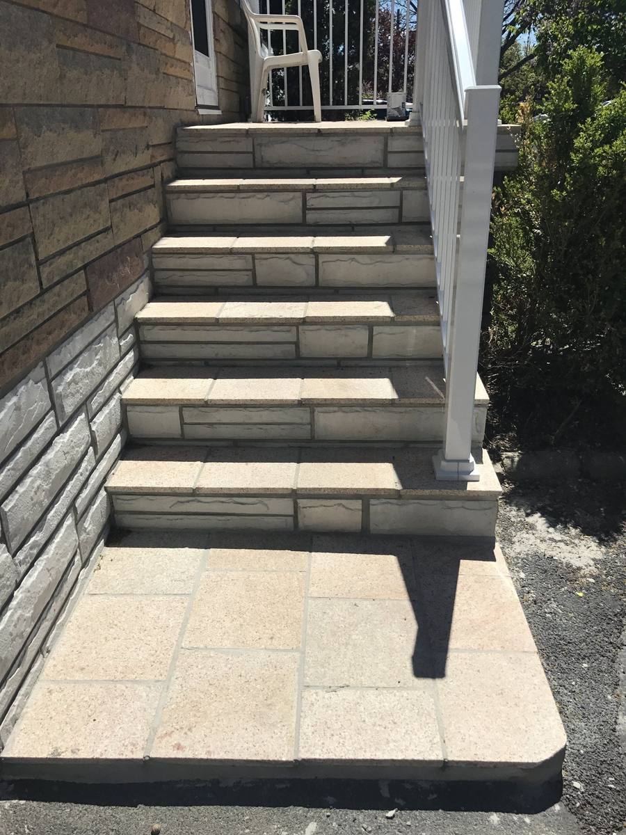 Patterned concrete, stonework and landscaping by Absolute Home Creations — project 1