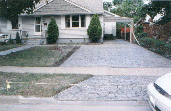 Patterned concrete, stonework and landscaping by Absolute Home Creations — project 2