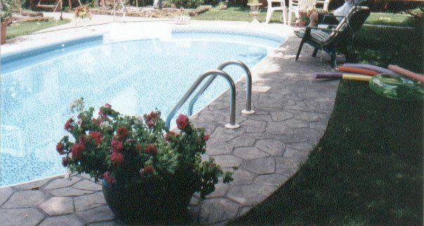 Patterned concrete, stonework and landscaping by Absolute Home Creations — project 5