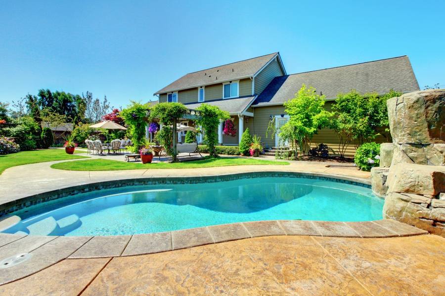 Patterned concrete, stonework and landscaping by Absolute Home Creations — project 8