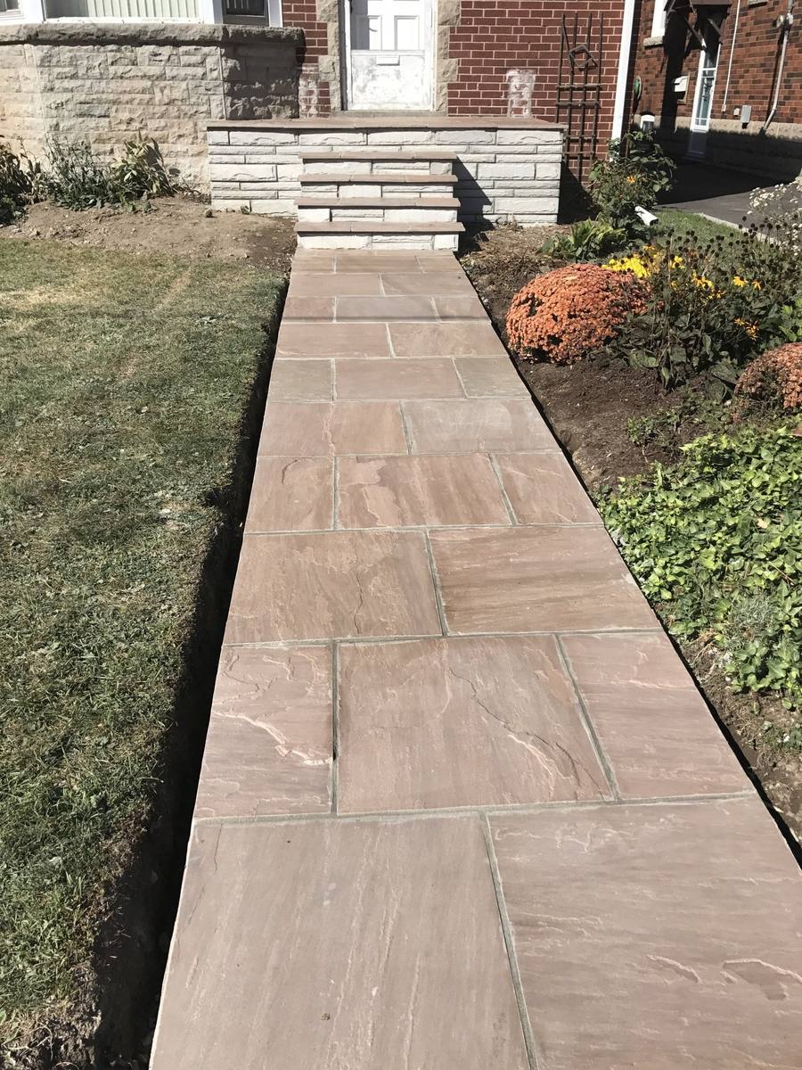 Patterned concrete, stonework and landscaping by Absolute Home Creations — project 10