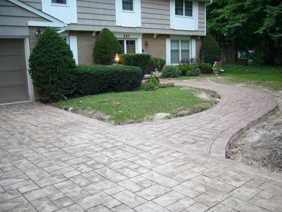 Patterned concrete, stonework and landscaping by Absolute Home Creations — project 12