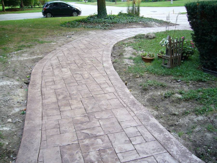 Patterned concrete, stonework and landscaping by Absolute Home Creations — project 13