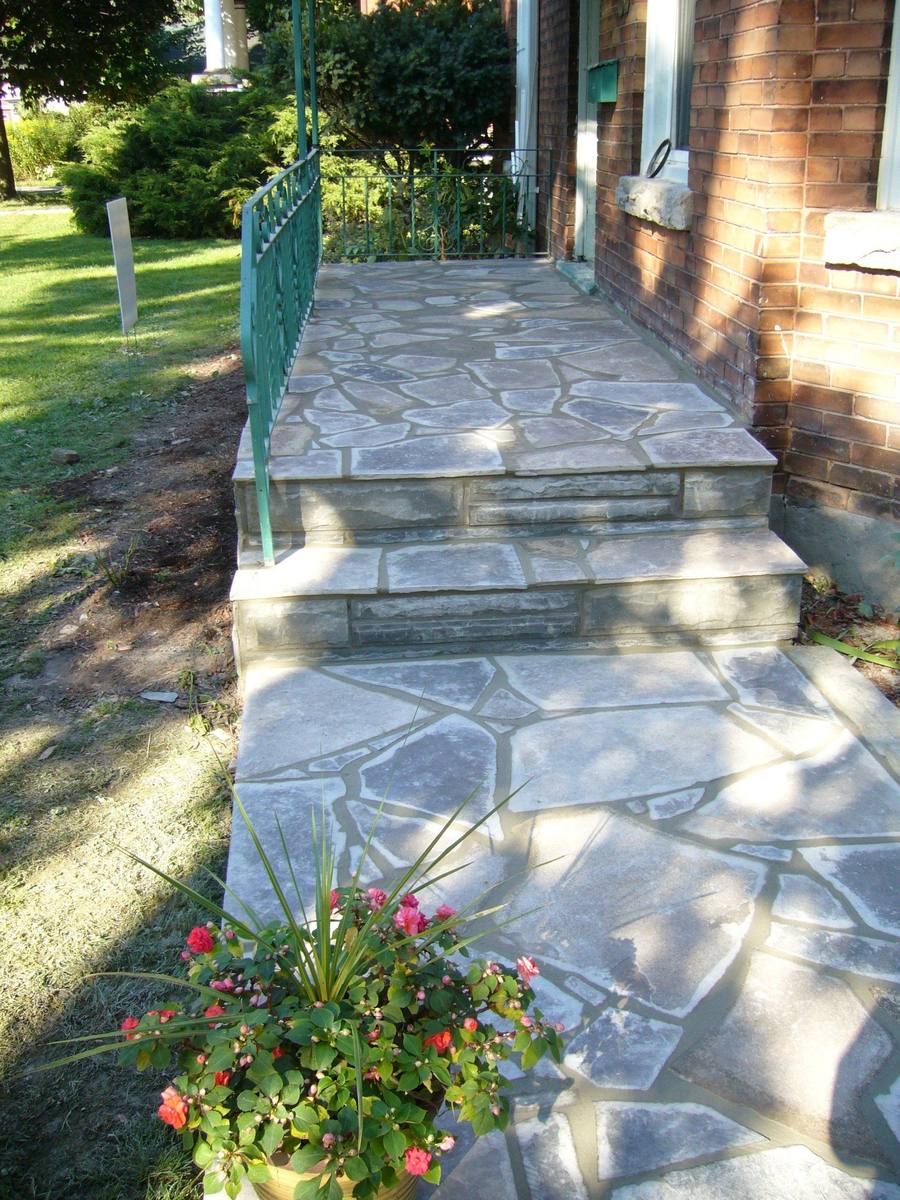 Patterned concrete, stonework and landscaping by Absolute Home Creations — project 14