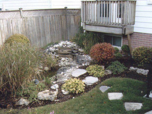 Patterned concrete, stonework and landscaping by Absolute Home Creations — project 20