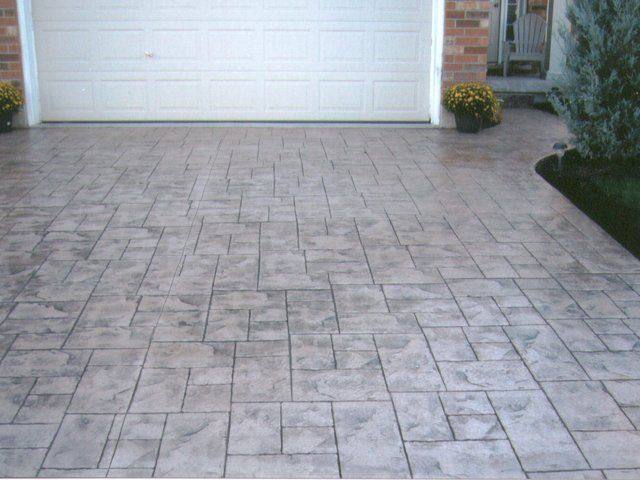 Patterned concrete, stonework and landscaping by Absolute Home Creations — project 21