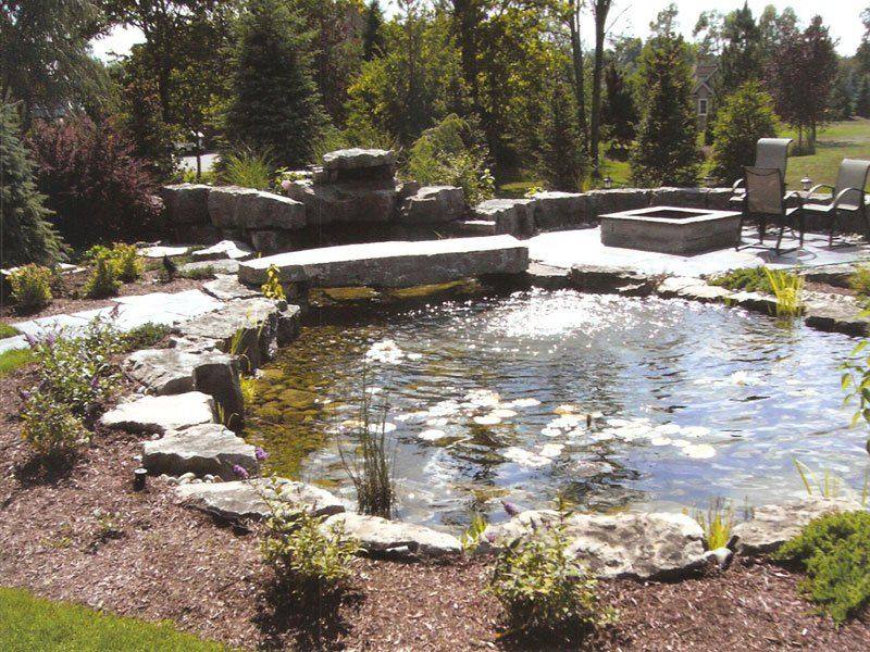 Patterned concrete, stonework and landscaping by Absolute Home Creations — project 26