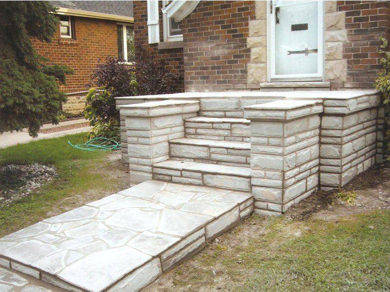 Patterned concrete, stonework and landscaping by Absolute Home Creations — project 27