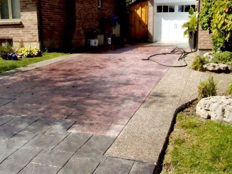 Patterned concrete, stonework and landscaping by Absolute Home Creations — project 32