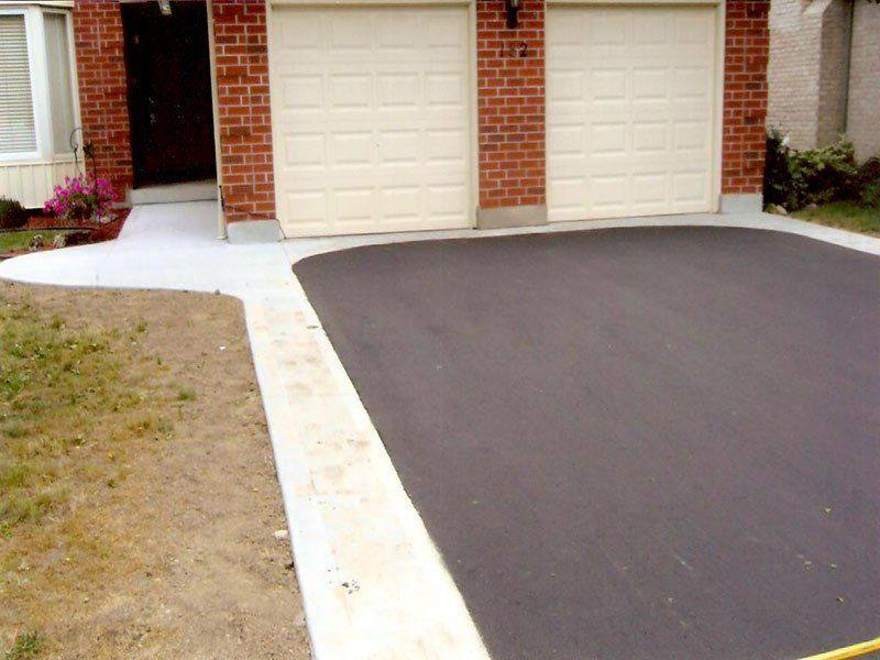 Patterned concrete, stonework and landscaping by Absolute Home Creations — project 34