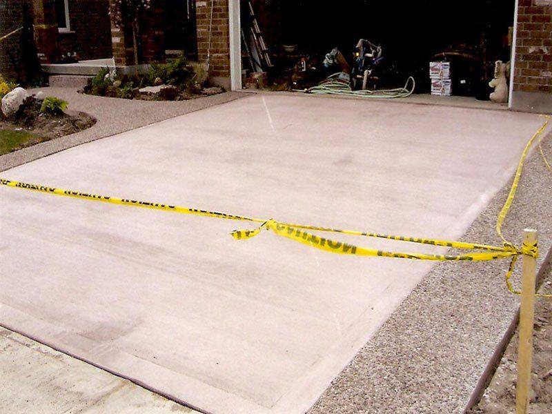 Patterned concrete, stonework and landscaping by Absolute Home Creations — project 36